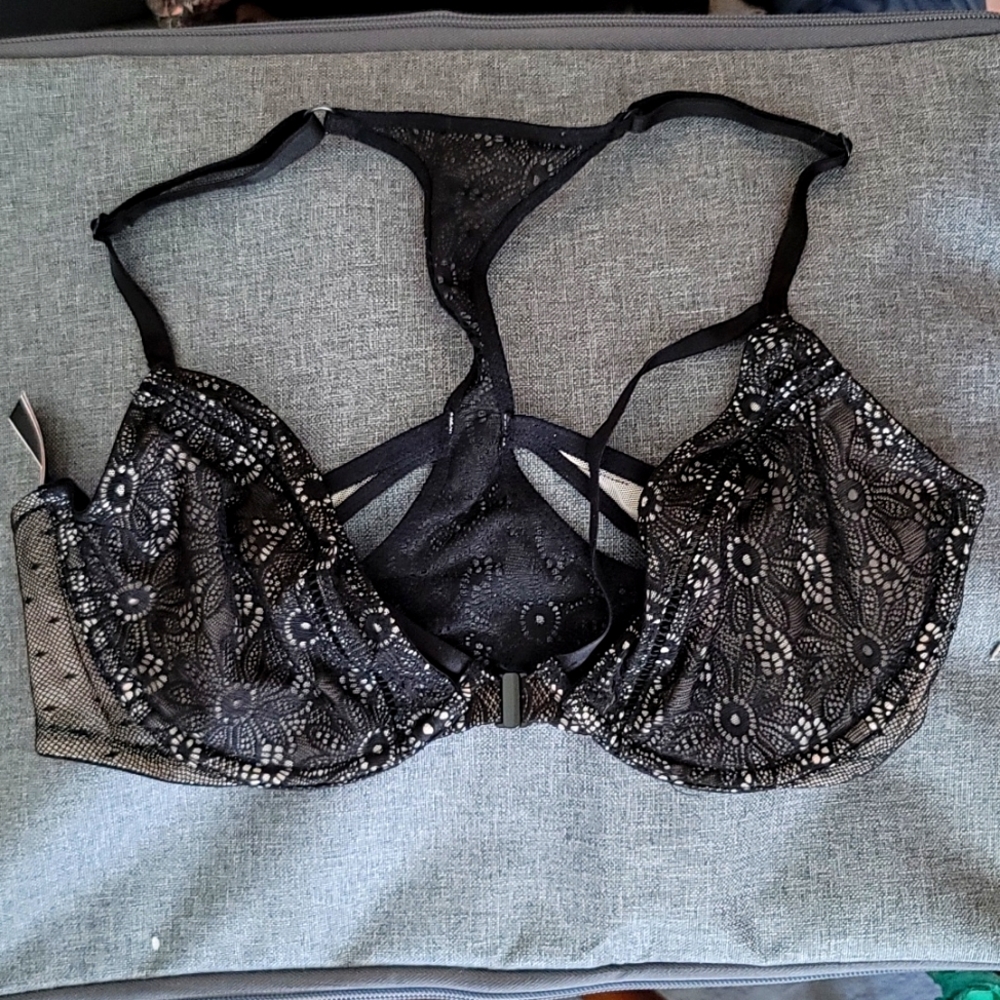 34D unpadded black bra. Front clasp